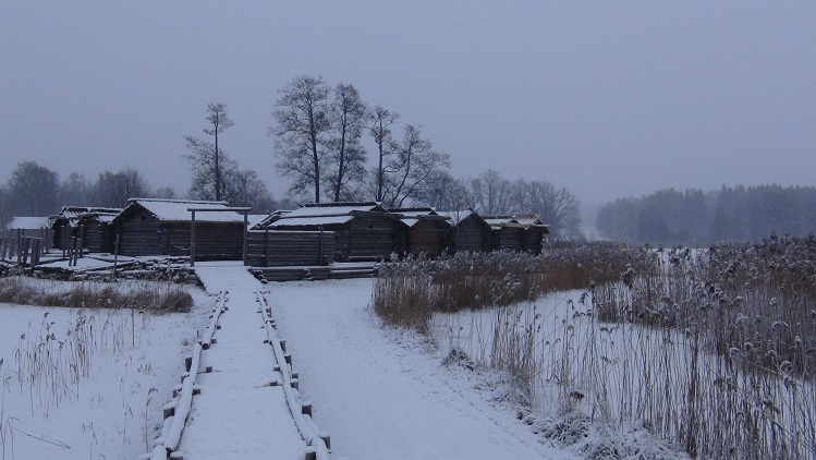 Reconstructed prehistoric Latvian village on a lake (10th century AD).