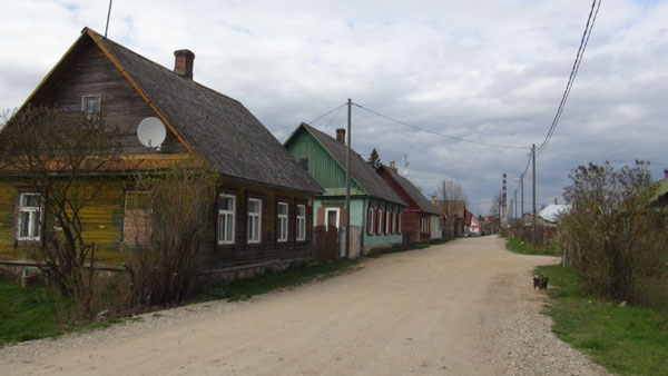 Old wooden homes in Grīva