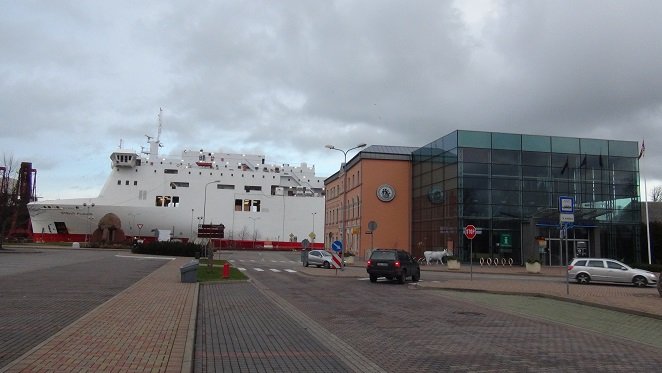 Transbaltic ferry moored in Venta river next to a modernized ferry terminal